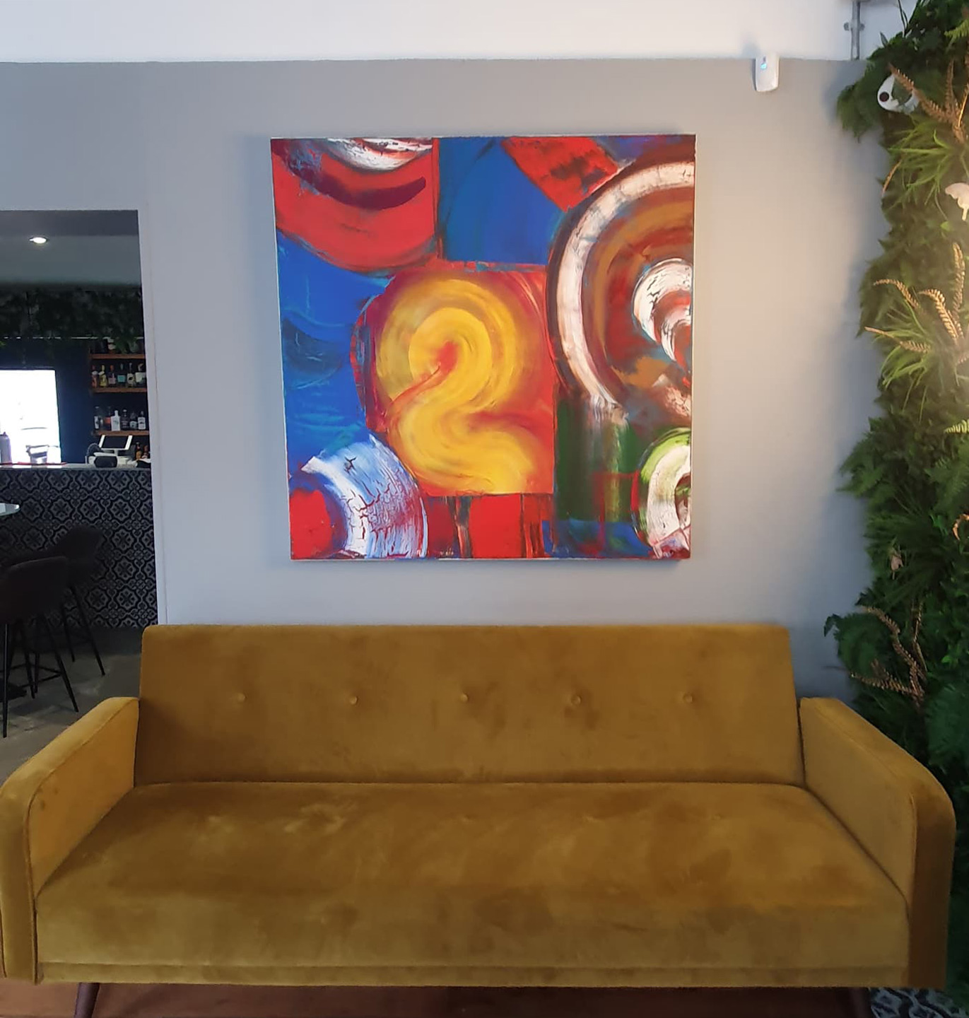 Martin Bush in studio with large painting